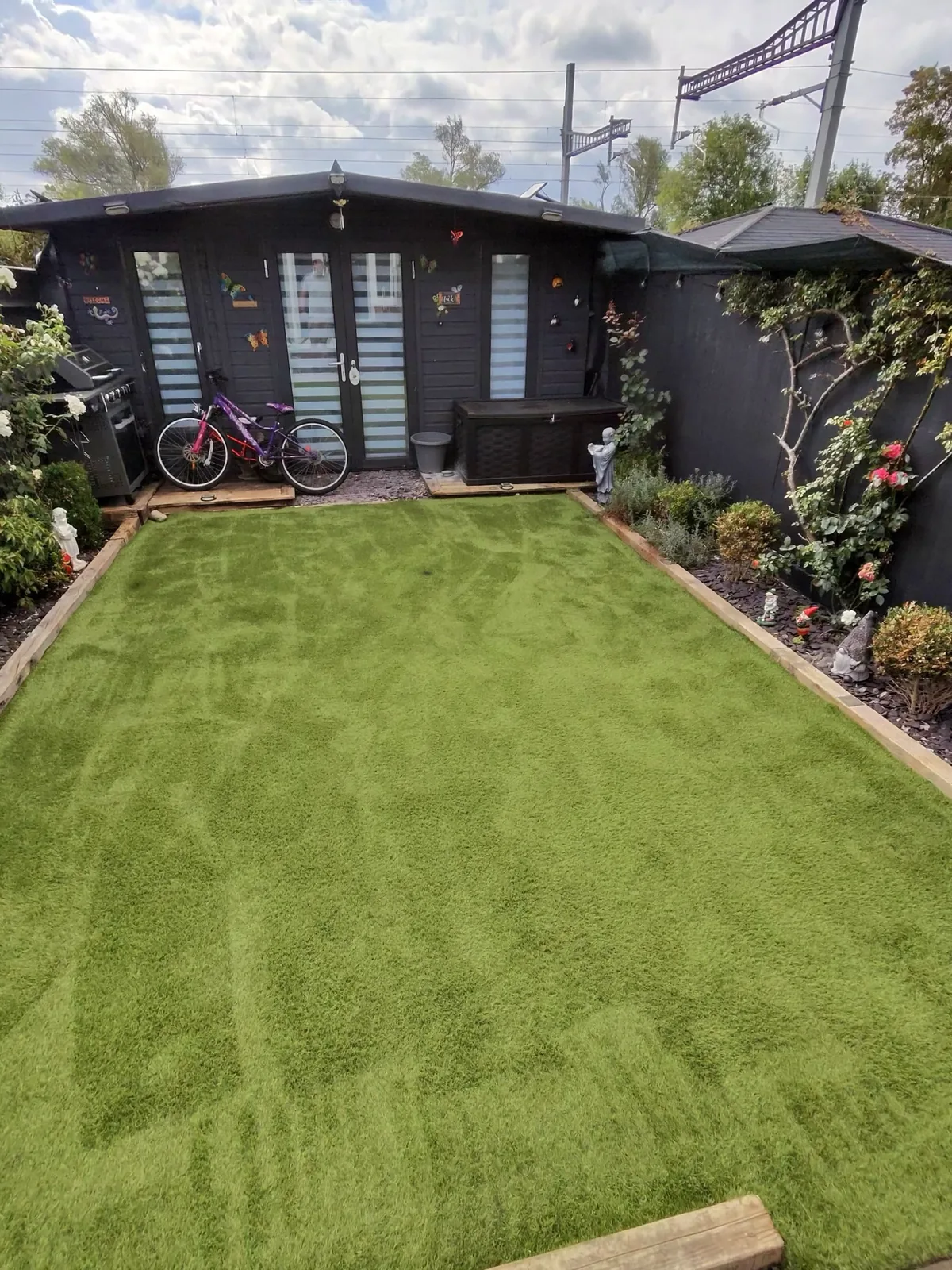 Freshly cleaned artificial grass lawn in Bracknell after professional treatment by PowerJ