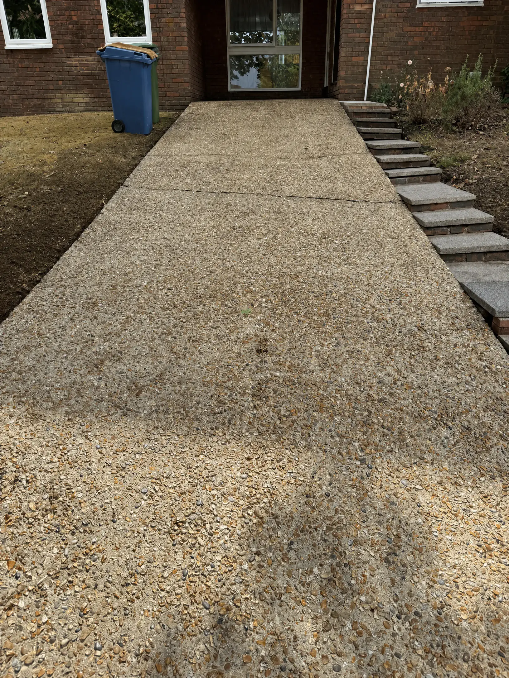 Exposed-aggregate driveway in Northcott, Bracknell after cleaning and biocide treatment by PowerJ Exterior Cleaning