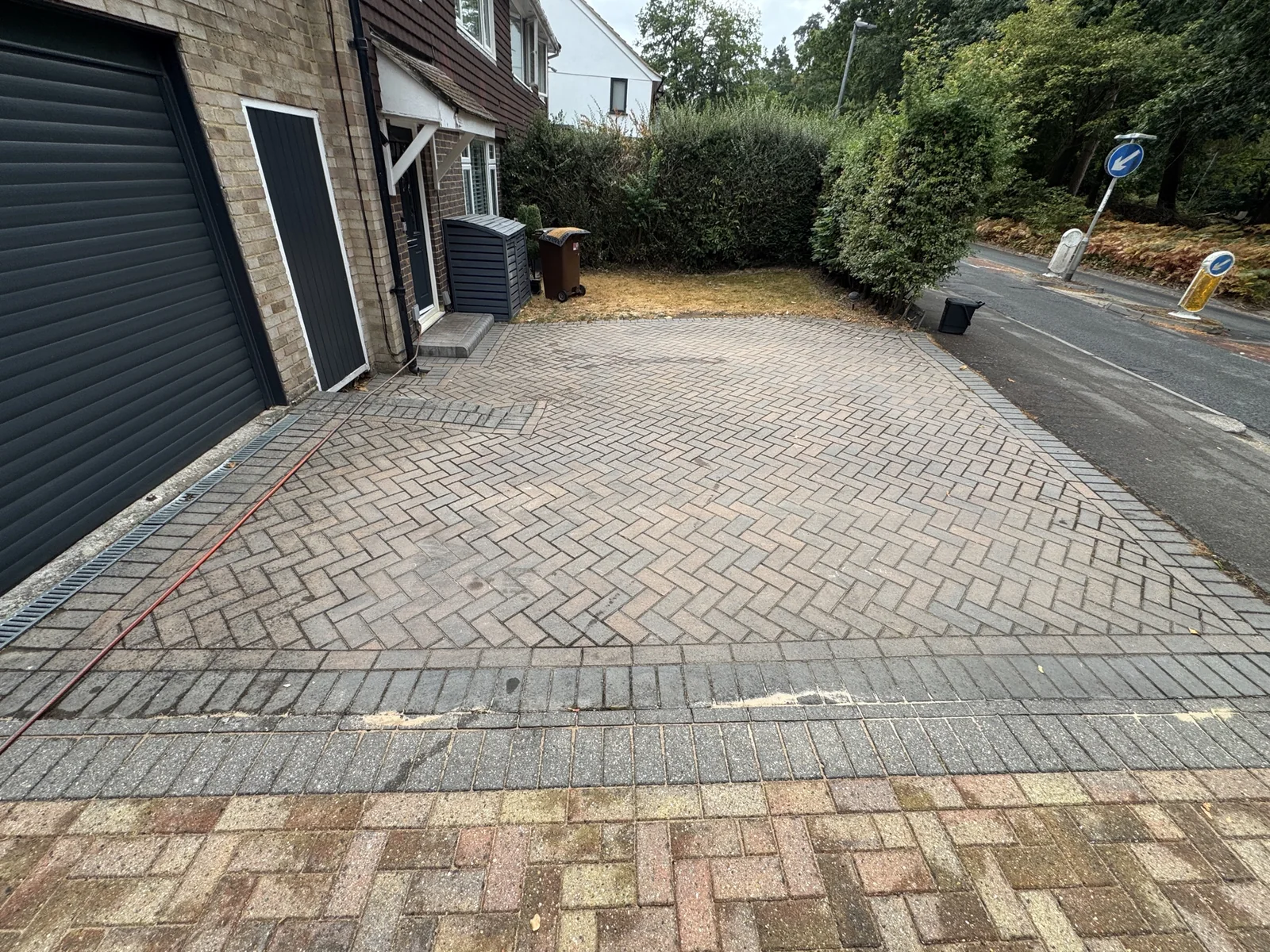 Winkfield block-paving driveway before pressure washing
