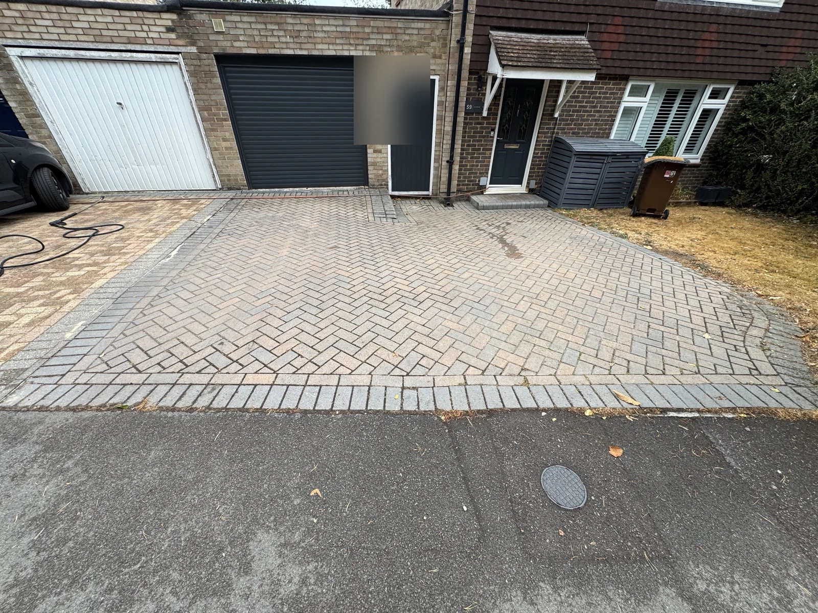 Block-paved driveway in Winkfield before professional cleaning