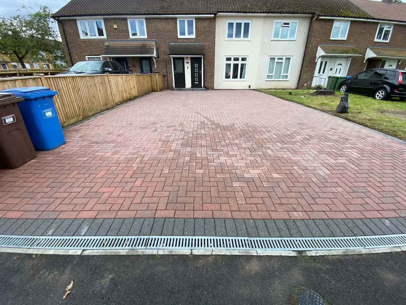 Block paving driveway after pressure washing — clean and restored