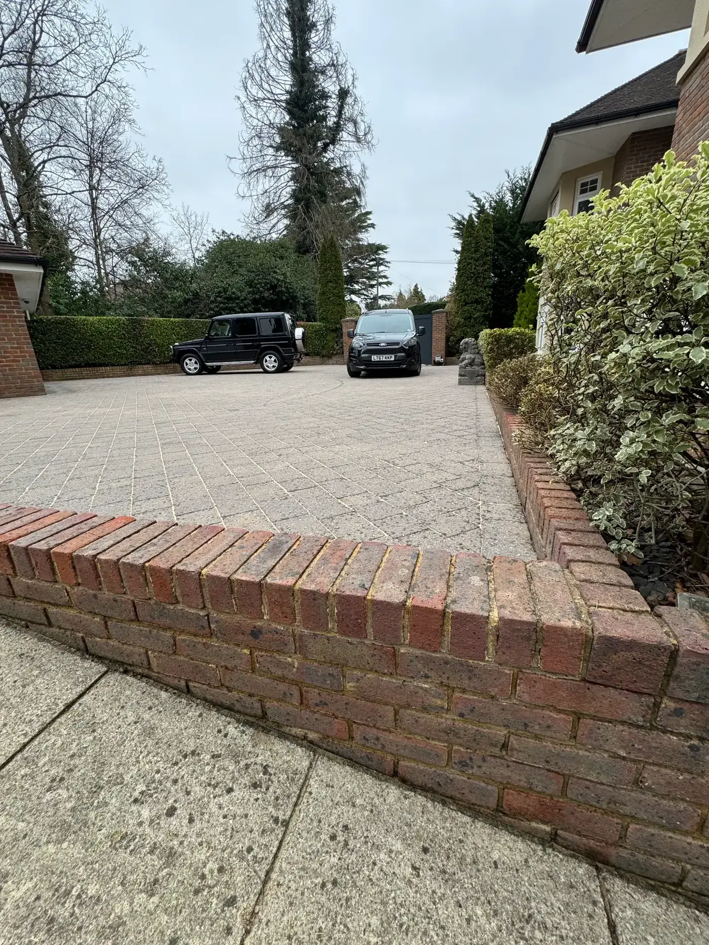 Cobble driveway after cleaning — pristine and restored