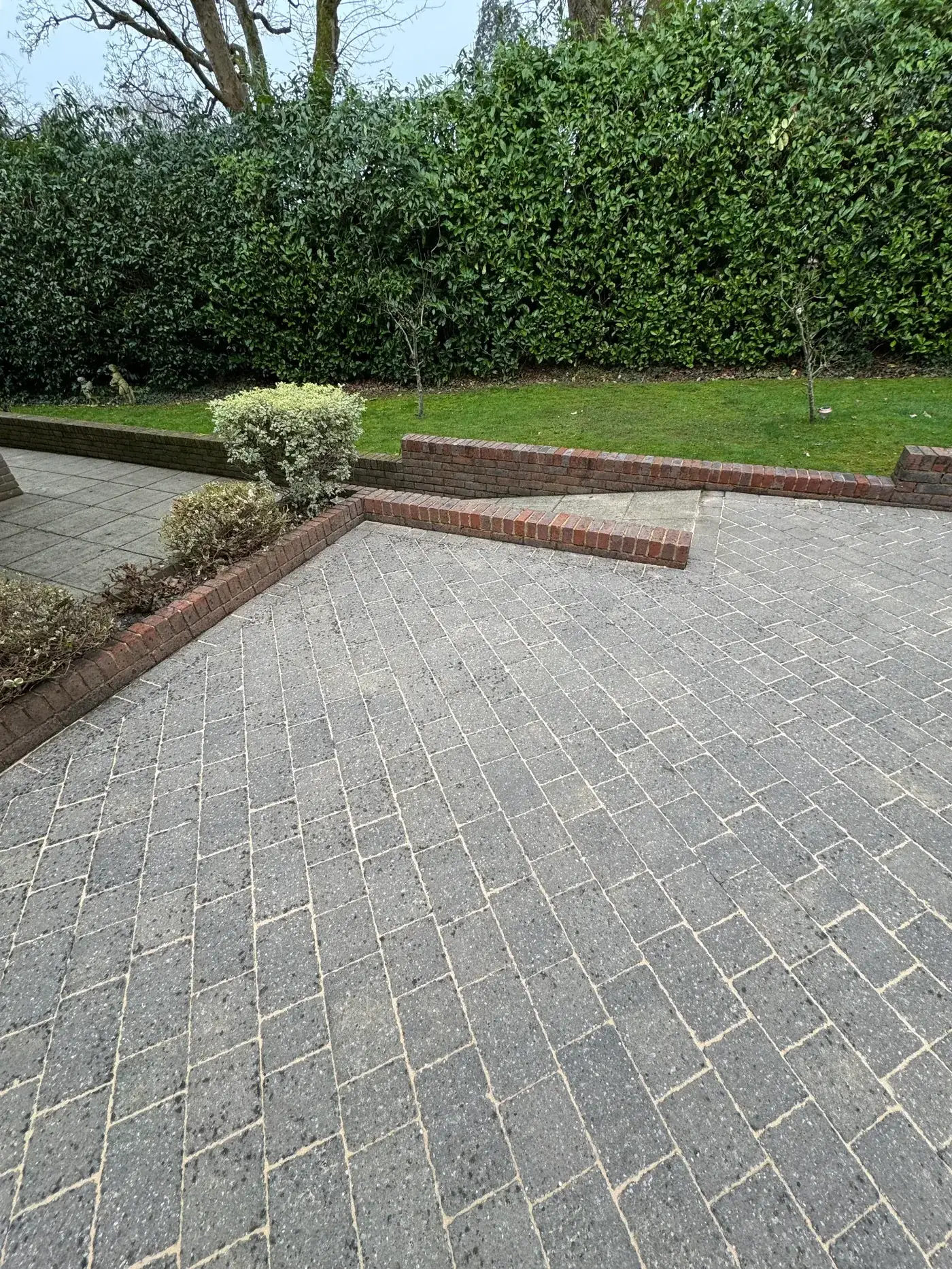 Cobble patio after cleaning — pristine and restored